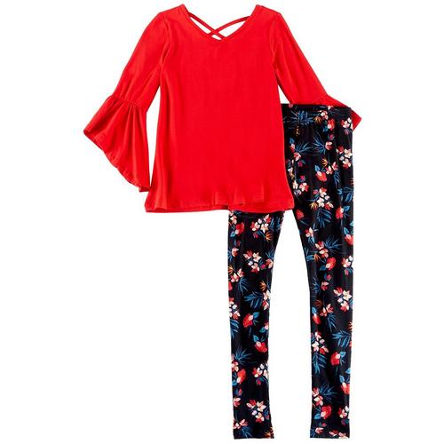 1st Kiss delivers fun and fashionable apparel! Three quarter sleeve top features a solid design, bell sleeves, a V-neckline, and stylish crisscross back. Set includes a coordinating pair of pull-on leggings with tropical floral print and an elastic waist.
