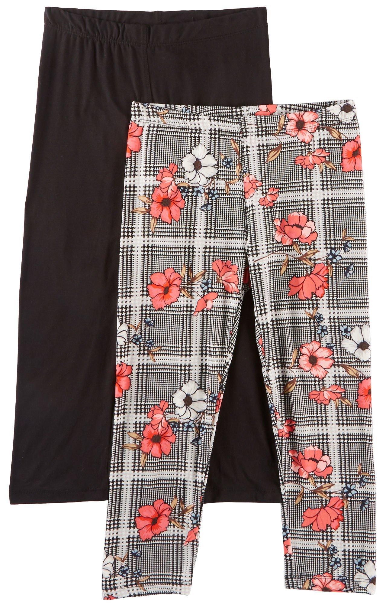 1st Kiss offers styles for the fun, free-spirited trendsetter. This two pack of leggings feature a vibrant pair of plaid & floral print leggings and a solid pair of leggings with elastic waists and a close, flattering fit.