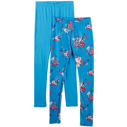 1st Kiss offers styles for the fun, free-spirited trendsetter. This two pack of leggings feature a pair of painted floral print leggings and a pair of solid leggings with elastic waists and a close, flattering fit.