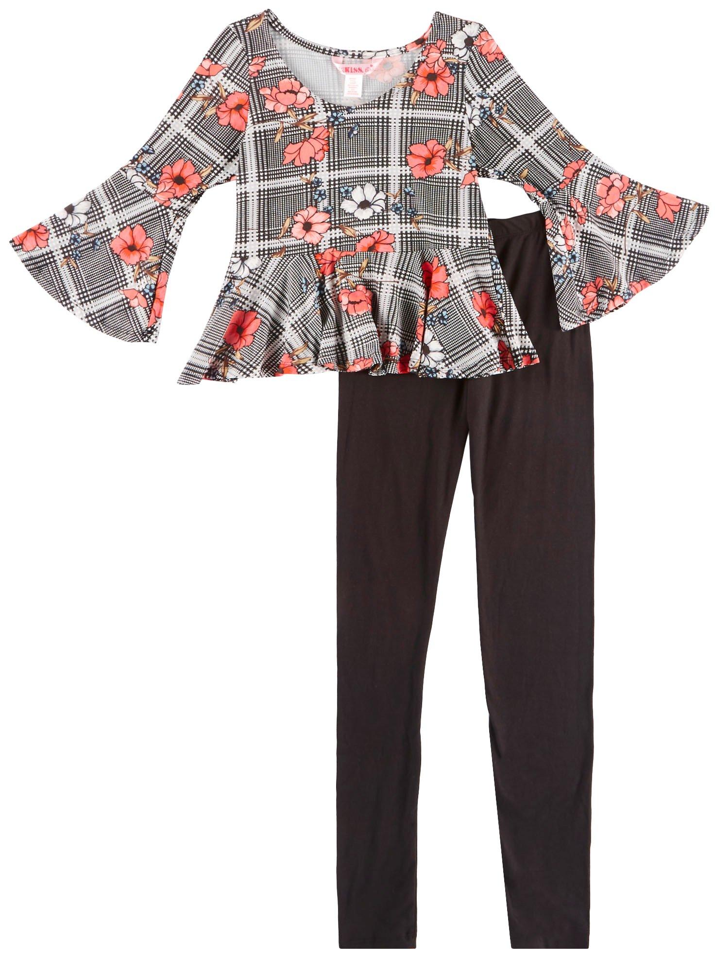 1st Kiss delivers fun and fashionable apparel! Three quarter sleeve peplum top features vibrant floral & plaid print, bell sleeves, and a round neckline. Set includes a coordinating pair of solid pull-on leggings with an elastic waist.