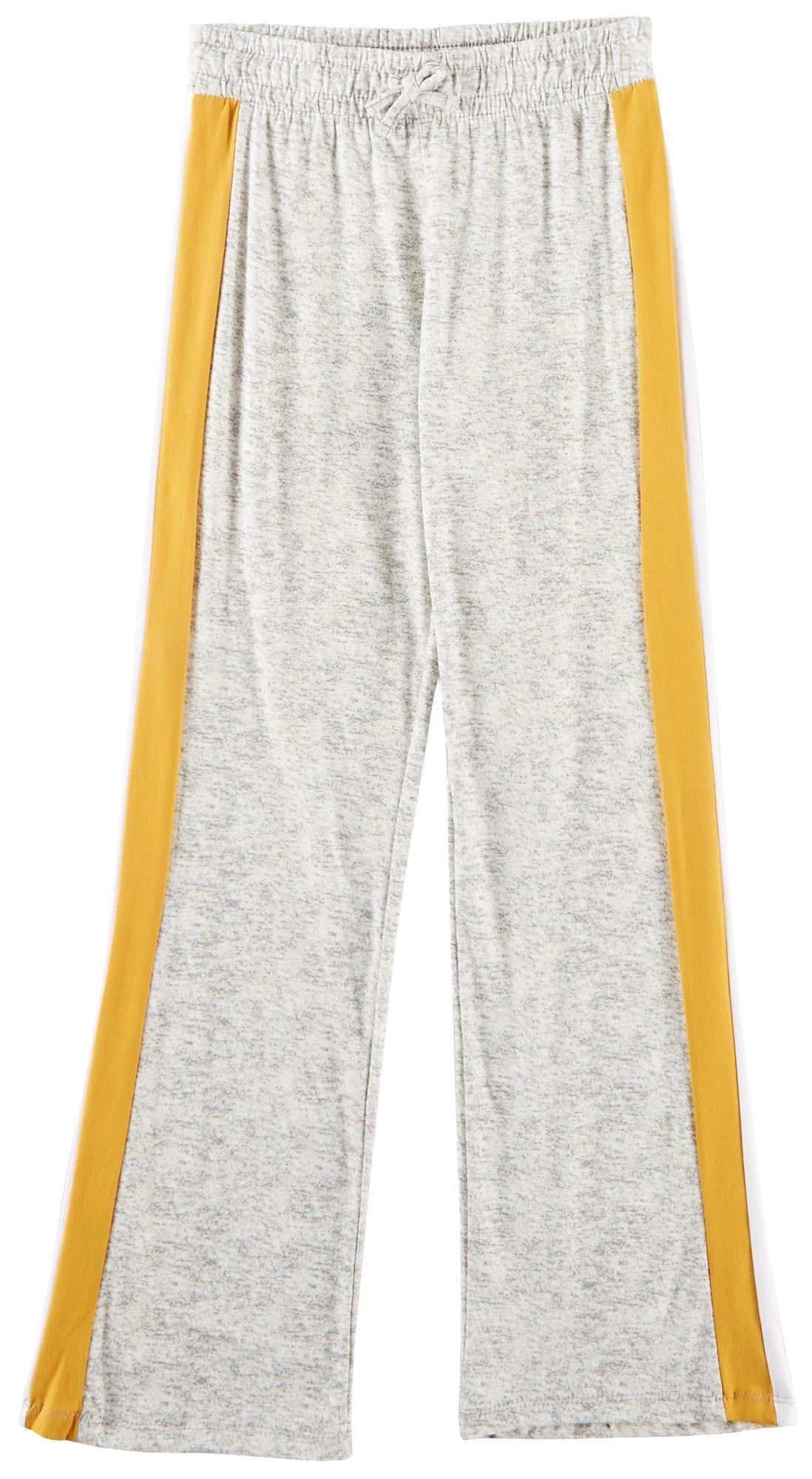 1st Kiss offers styles for the fun, free-spirited trendsetter. These jogger pants feature a heathered design, contrast sports striping, and an elastic waist.
