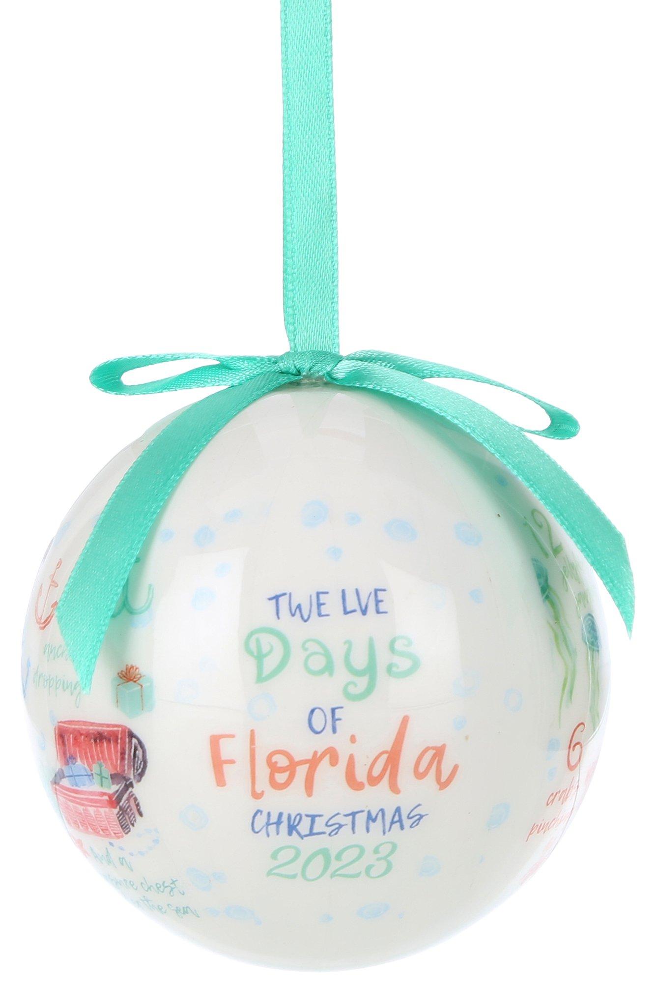 https://images.beallsflorida.com/i/beallsflorida/689-0739-6016-00-yyy/*12-Days-Of-Florida-Christmas-2023-Christmas-Ornament*?$product$&fmt=auto&qlt=default